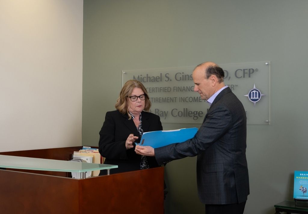 A professional interaction between Michael S. Ginsberg and Kelly in our office